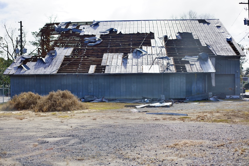 Storm Damage Restoration for Barns, Garages, and Equipment Buildings: Why to Call a Pro